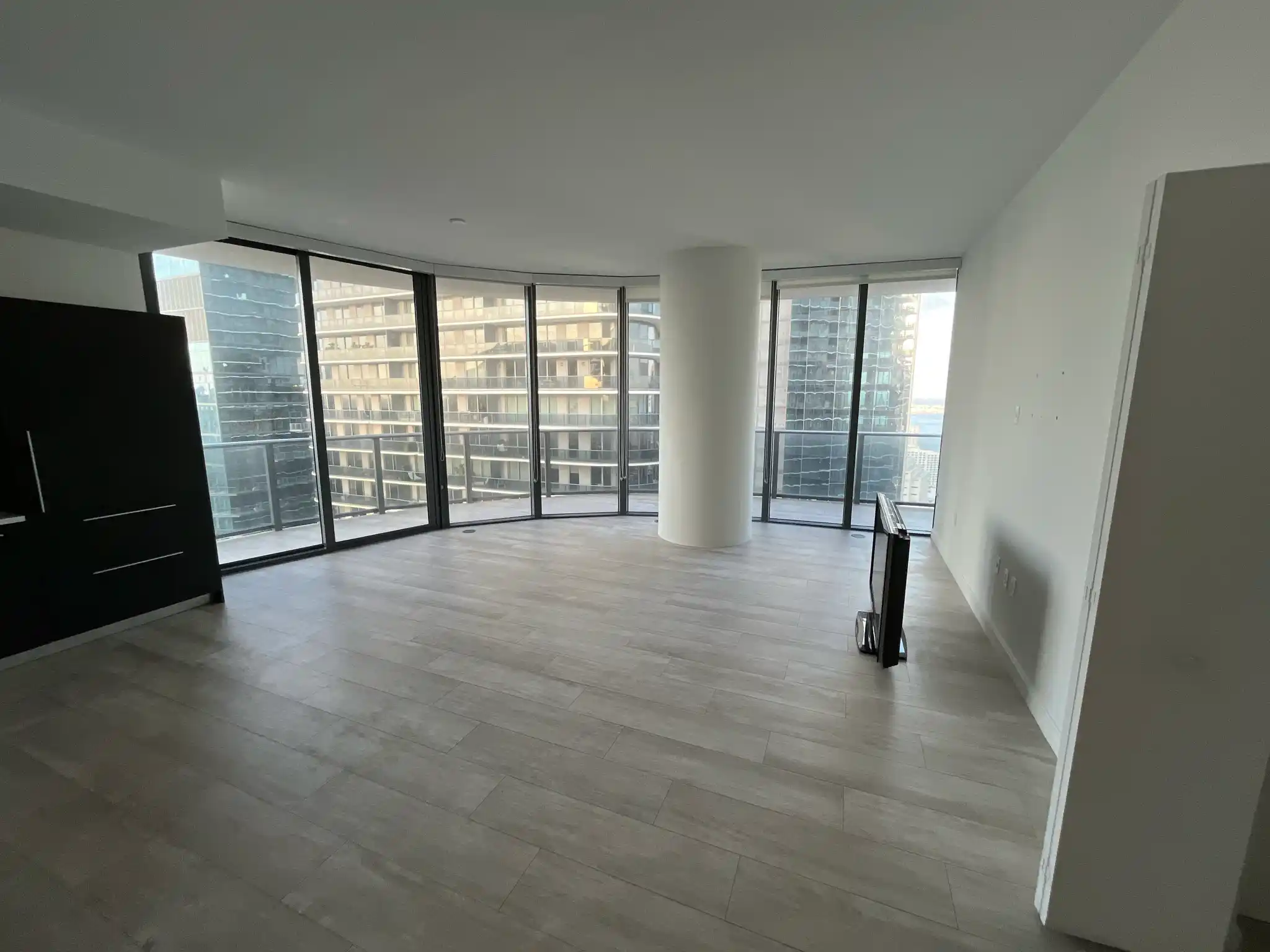 Empty room with bare floors and walls